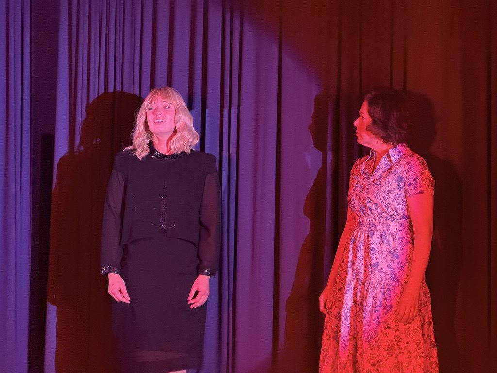 Mrs. Lyons confronts Mrs. Johnstone